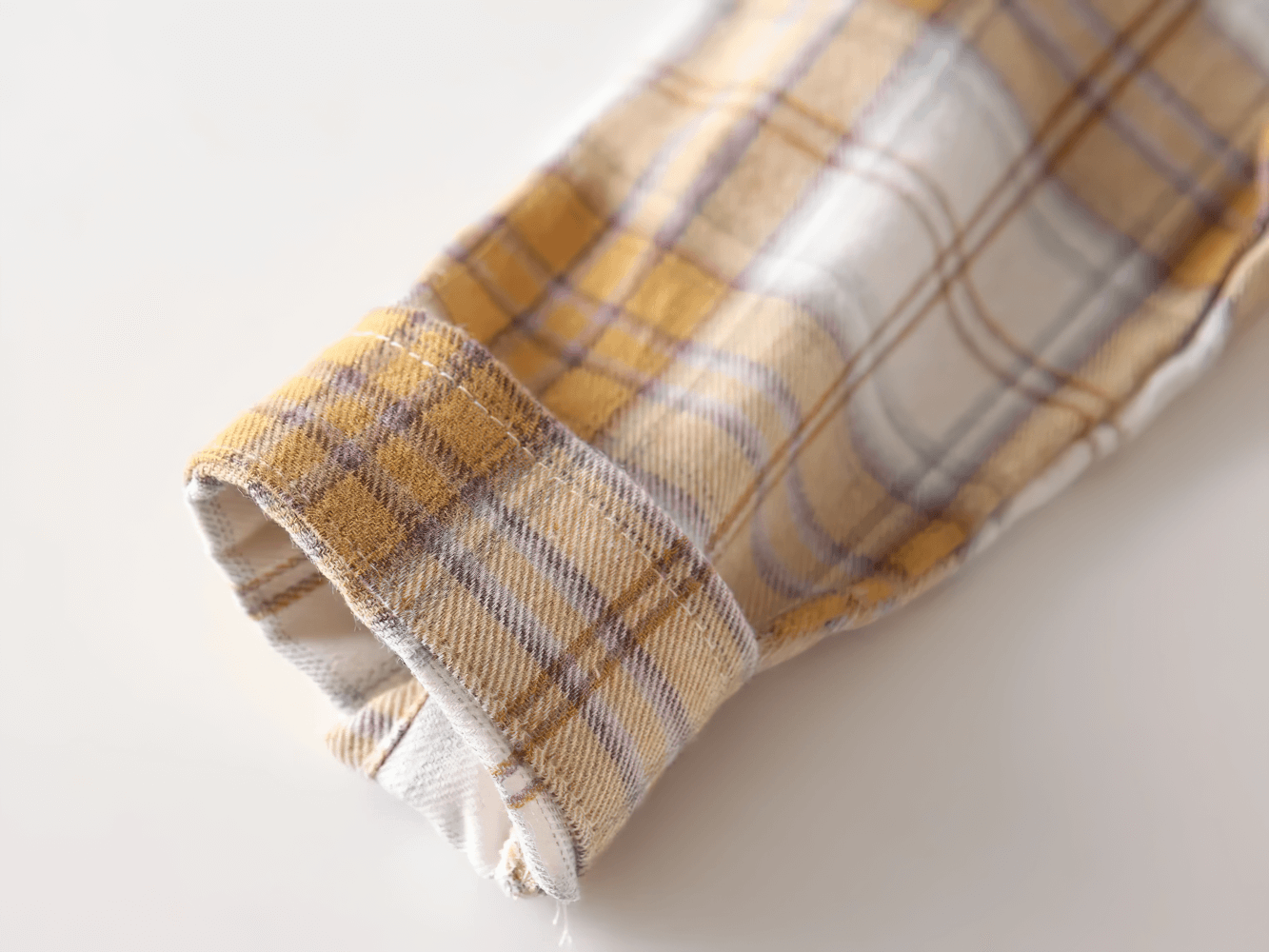 Close-up of Plaid Long-Sleeved Toddler Boys Flannel Shirt - SF3521 sleeve showing soft checked fabric.